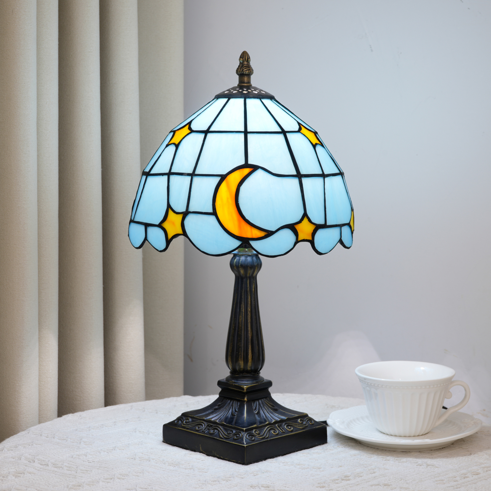 Blivuself Blue Celestial Moon & Star Stained Glass Tiffany Table Lamp, Handcrafted Whimsical Design, Small Vintage Nightstand Light with Bronze Base for Bedroom, Reading Nook, and Boho Home Decor OFU1428