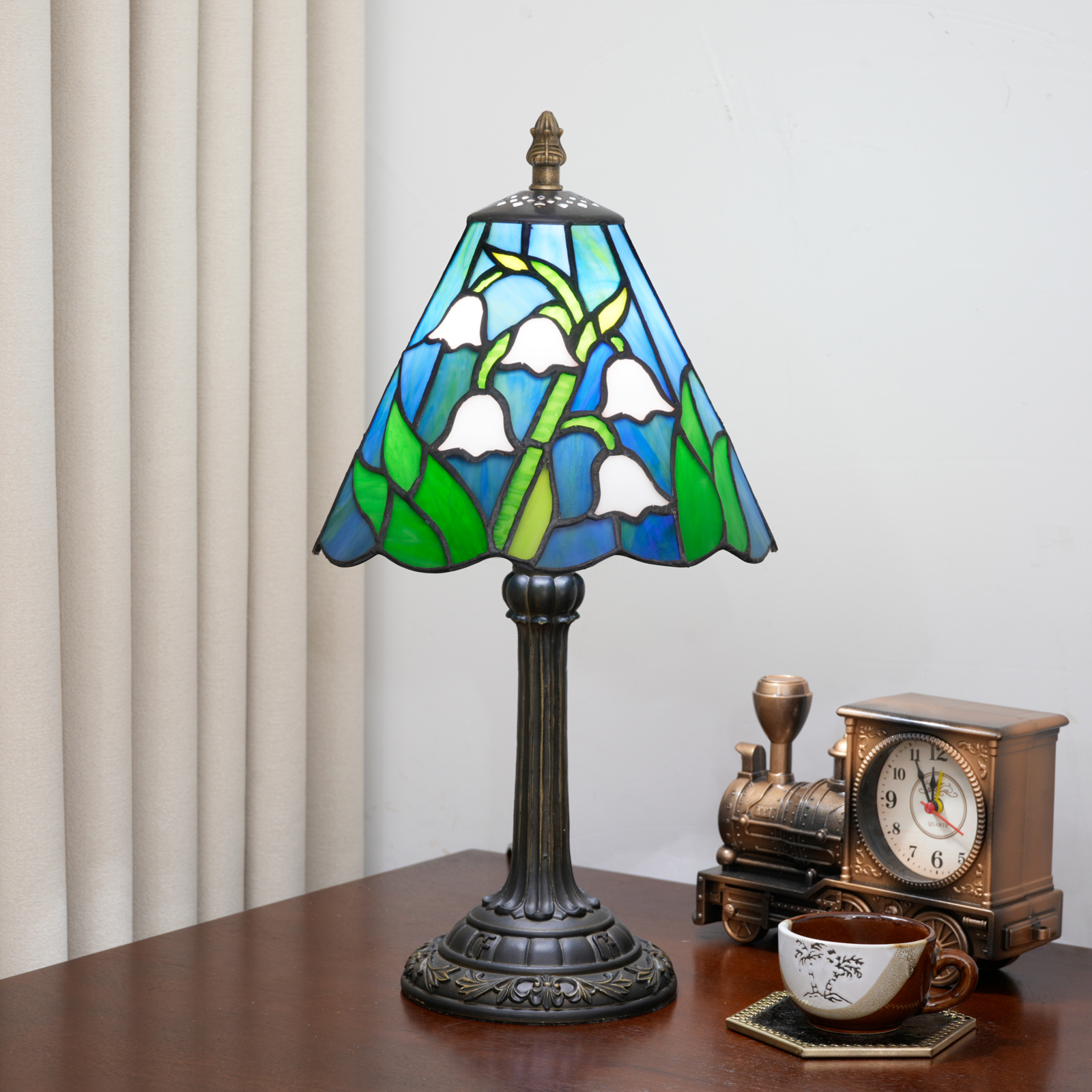 Blivuself 8 Inch Tiffany Style Lily of the Valley Stained Glass Table Lamp, Small Floral Night Light Desk Lamp with Blue Sky & Green Leaf Shade, Antique Bronze Resin Base, for Living Room, Bedroom, Office, Nightstand & Nature-Inspired Home Decor OFU1450