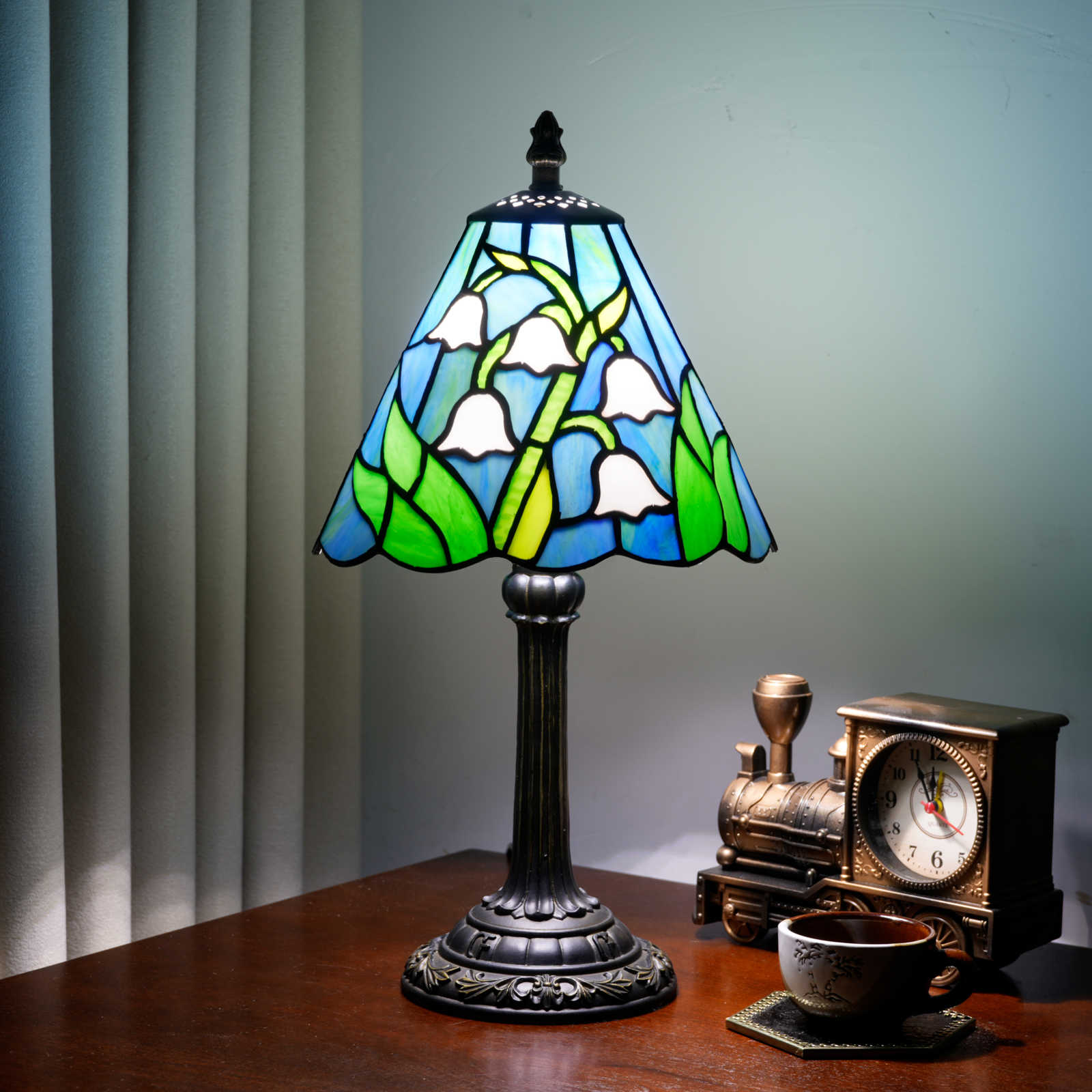 Blivuself 8 Inch Tiffany Style Lily of the Valley Stained Glass Table Lamp, Small Floral Night Light Desk Lamp with Blue Sky & Green Leaf Shade, Antique Bronze Resin Base, for Living Room, Bedroom, Office, Nightstand & Nature-Inspired Home Decor OFU1450