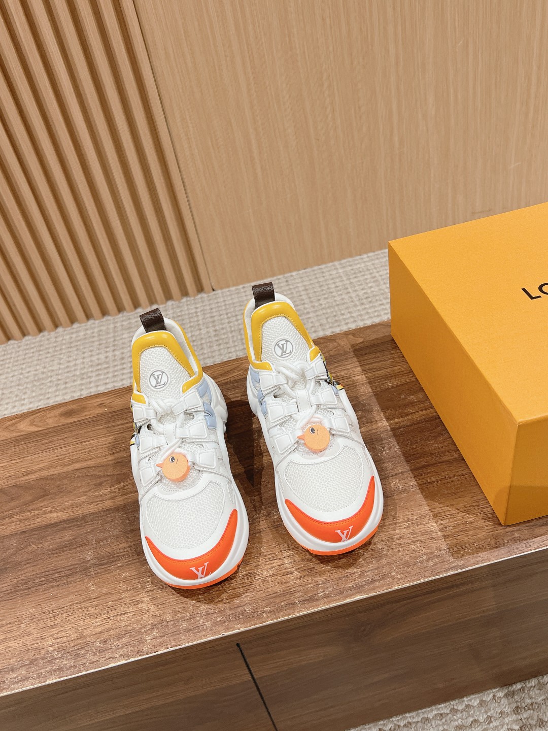 Louis Vuitton Archlight leather white orange
