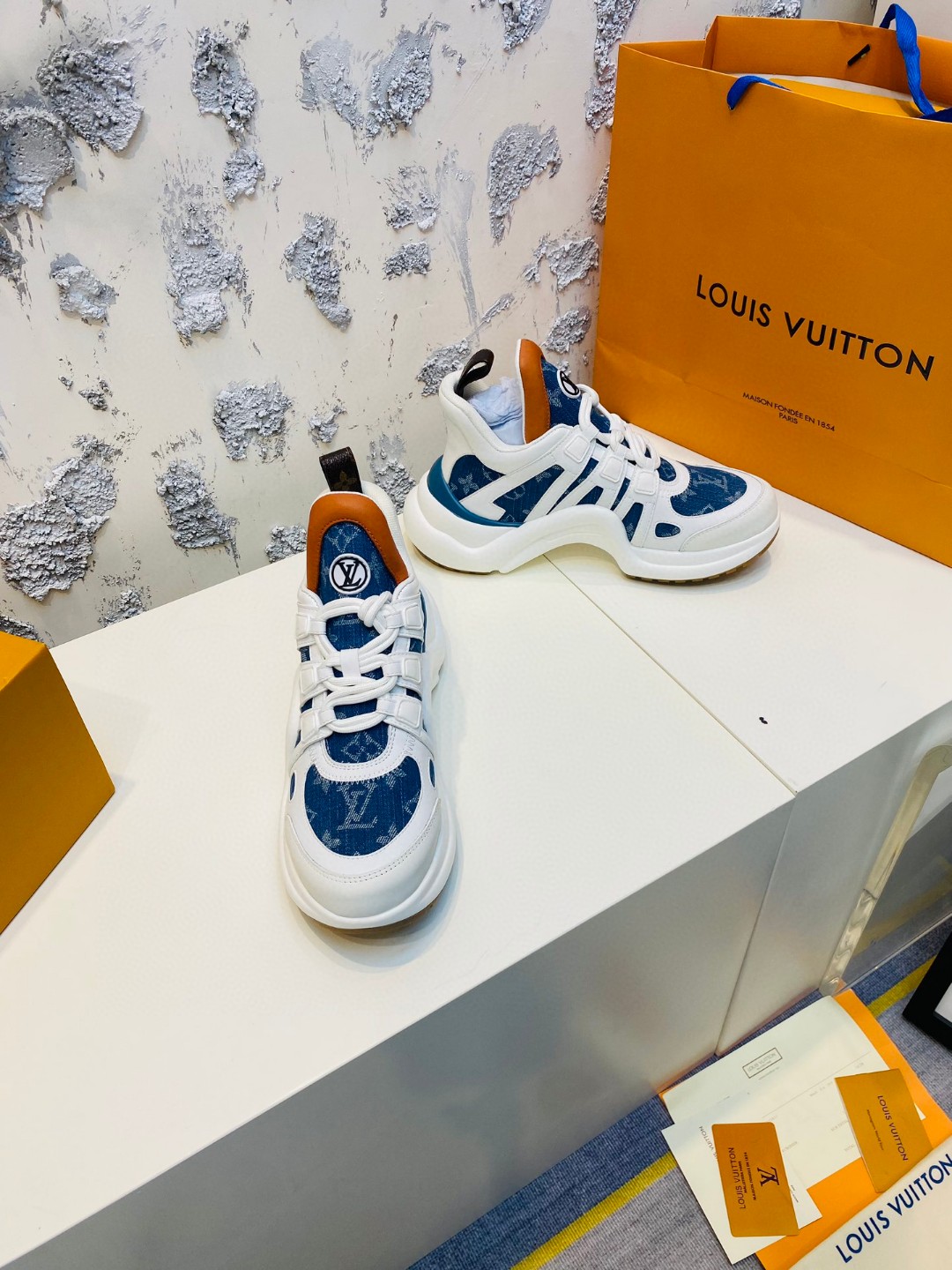 Louis Vuitton Cruise Archlight logo white blue orange