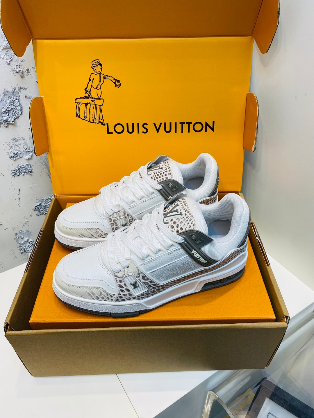 Louis Vuitton X Tyler Trainer stone pattern sneakers white grey