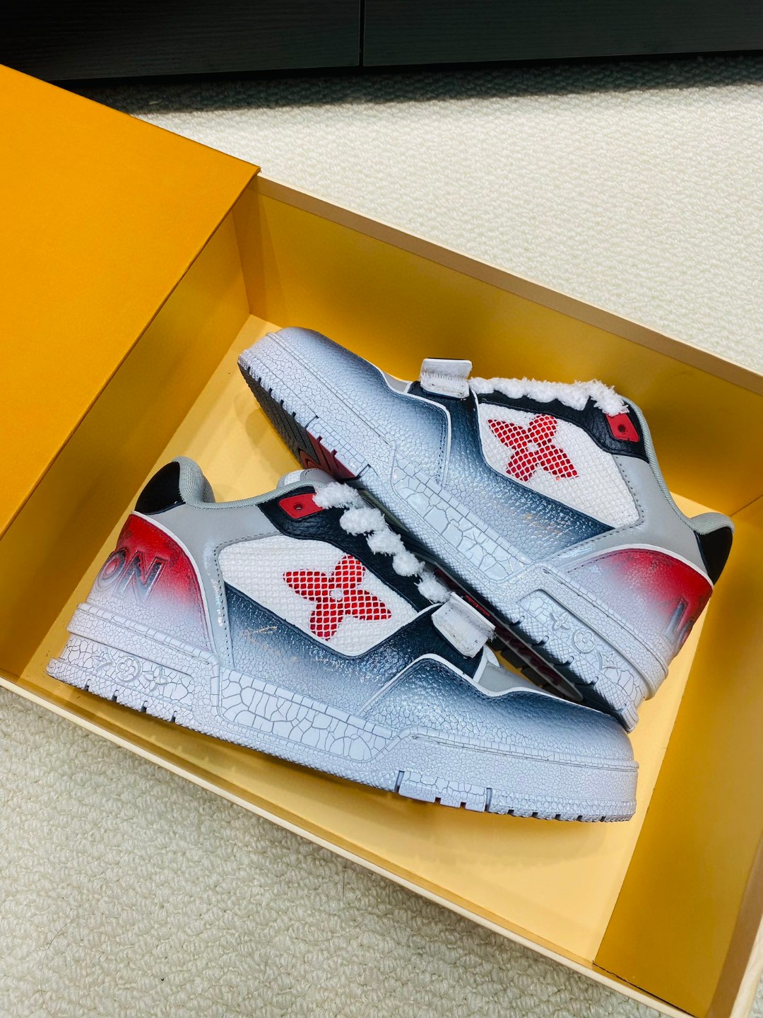 Louis Vuitton X Tyler Trainer Burst pattern sneakers red