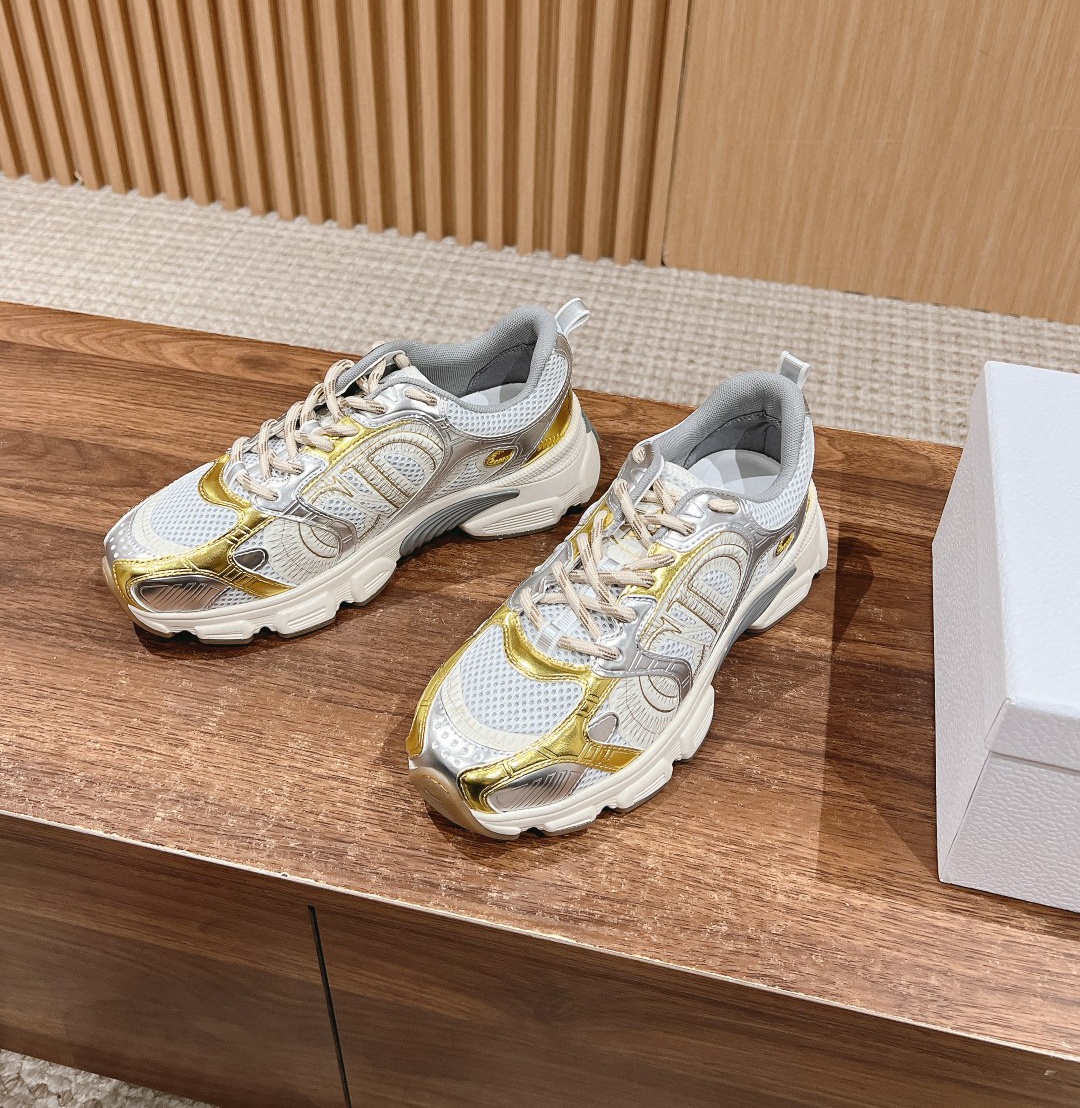 Dior Chrono round toe lace up sneakers golden