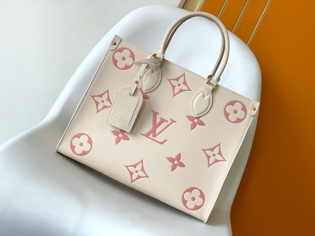Louis Vuitton on the go handbag tote medium cream white and pink