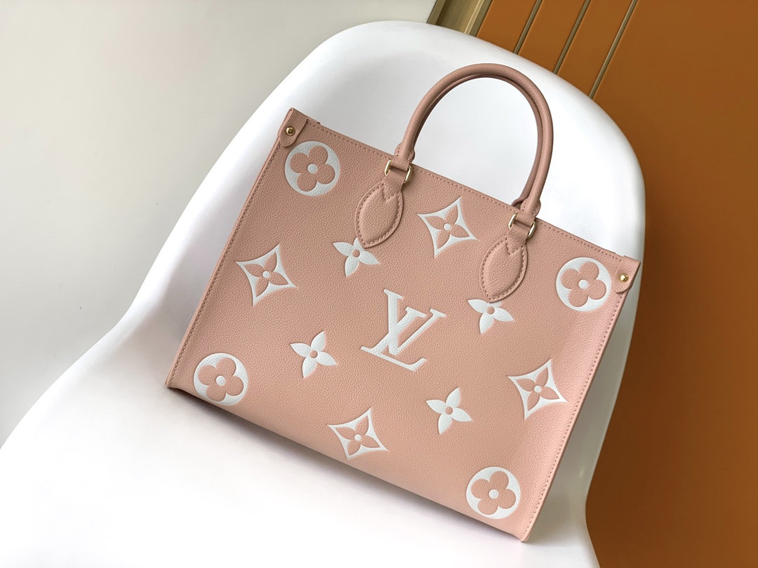 Louis Vuitton on the go handbag tote medium pink