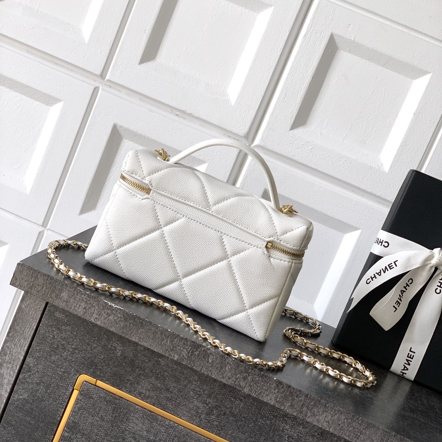 Chanel 25K vanity with chain bag White