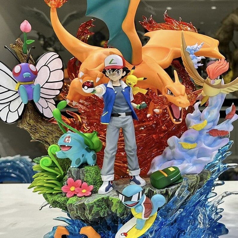 Pokémon family portrait, Charizard, Pikachu, Bulbasaur, Squirtle statue