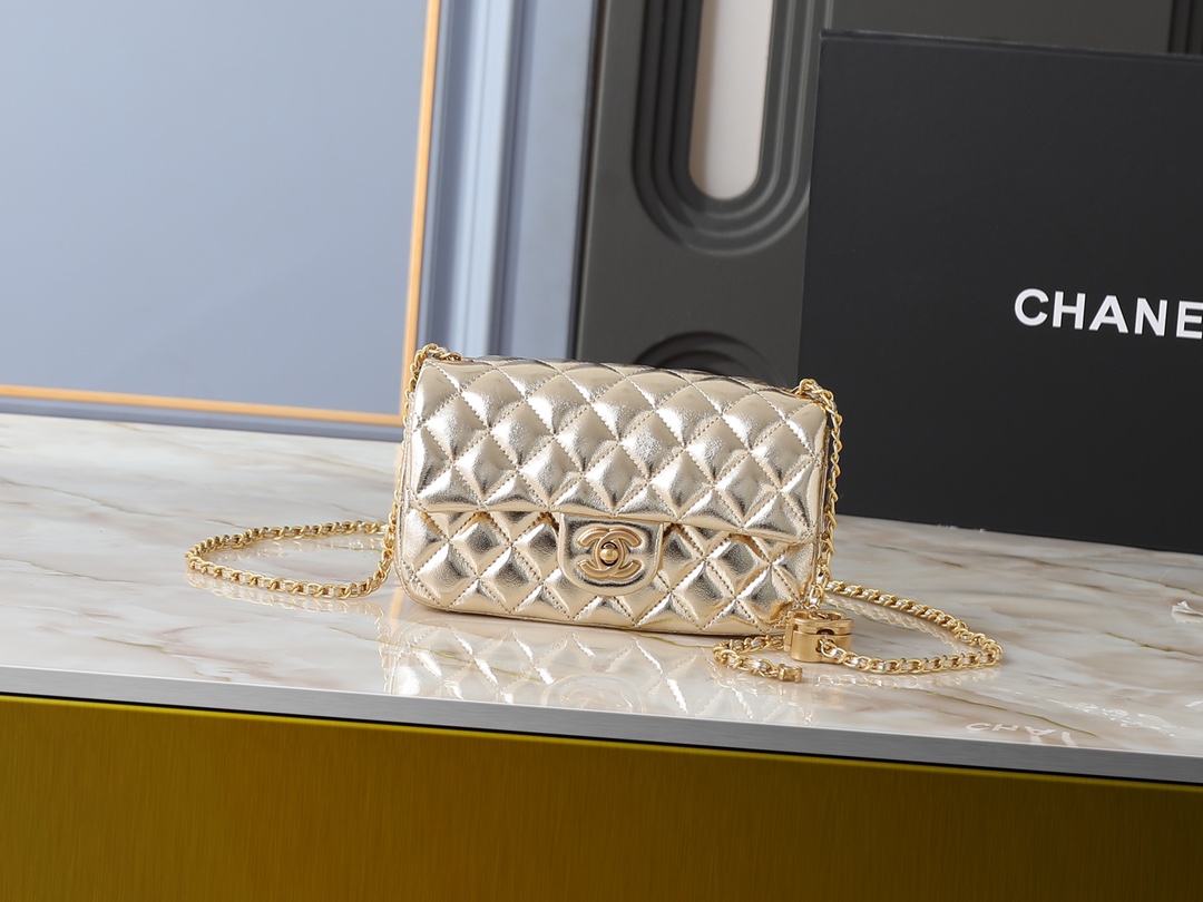 Mini cowhide shoulder bag with gold chain