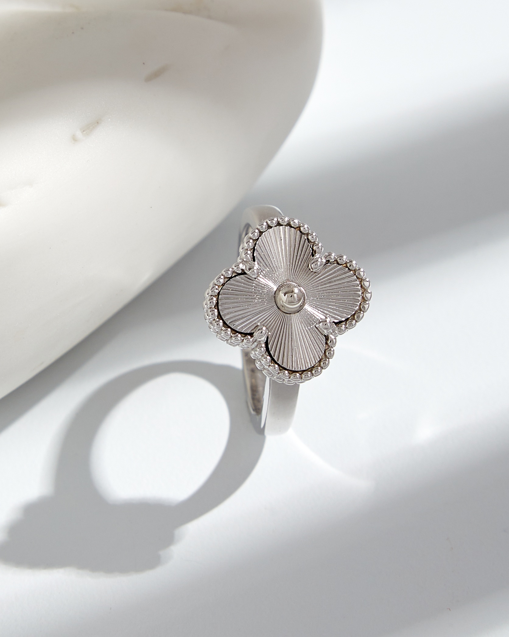 Carved four leaf clover ring