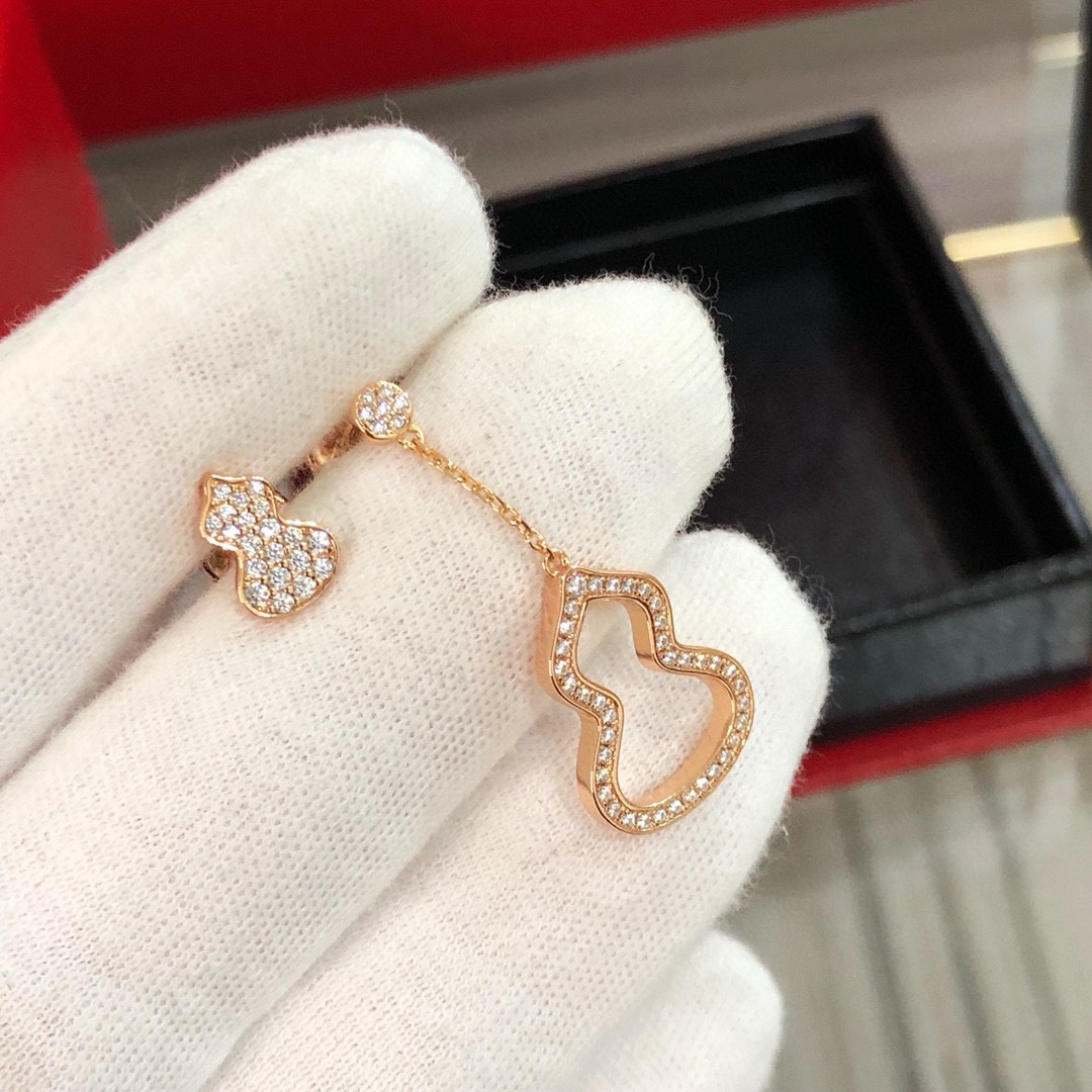 Asymmetric AB style diamond studded earrings with gourd