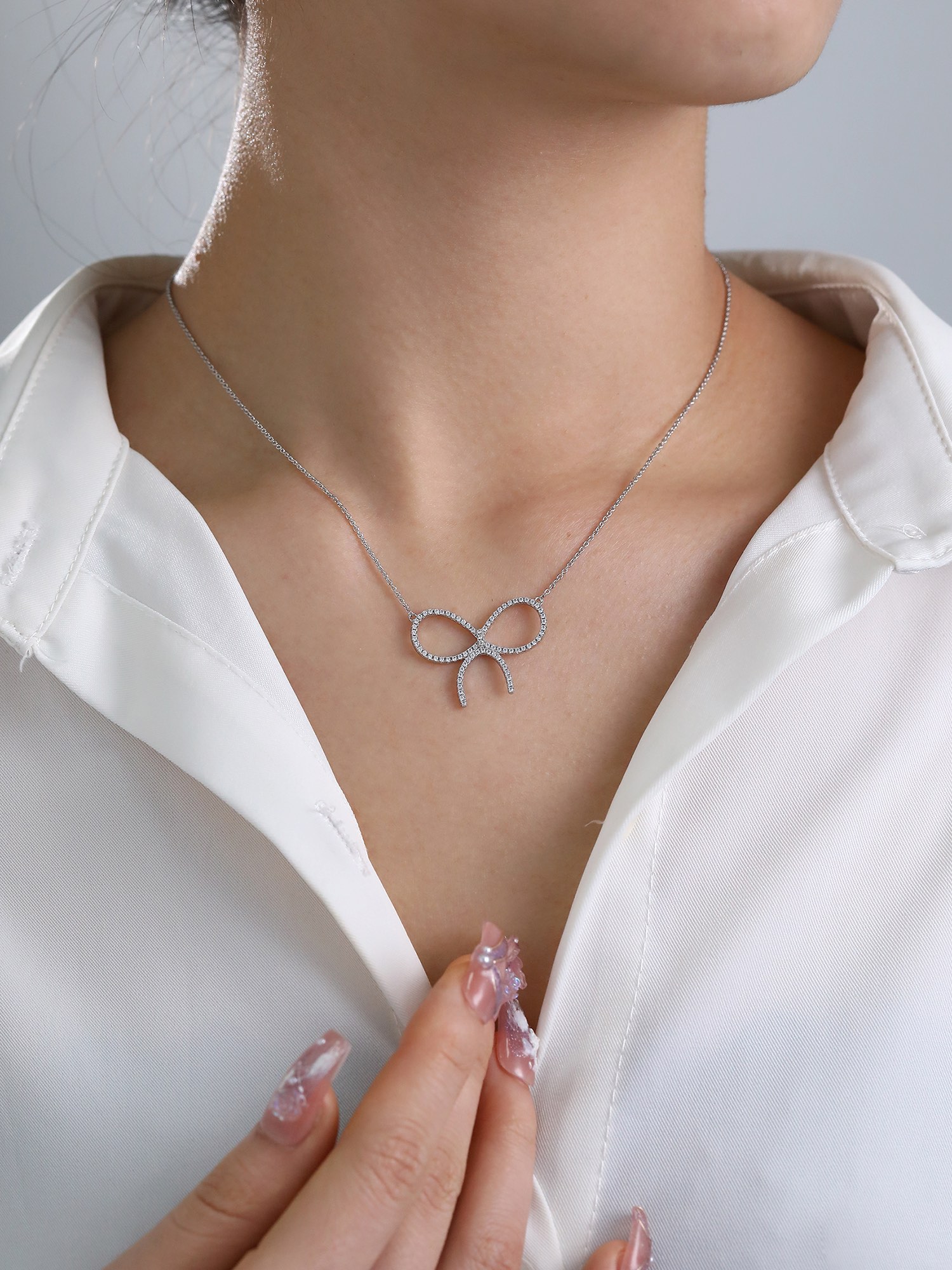 Handmade diamond studded bow necklace