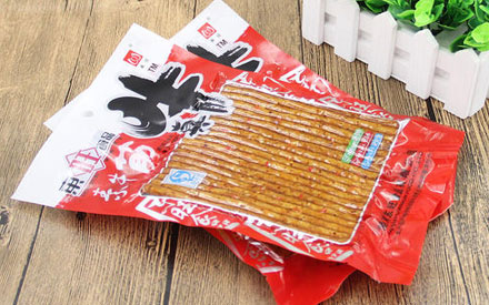 What packaging material is used for the spicy strip packaging bag?