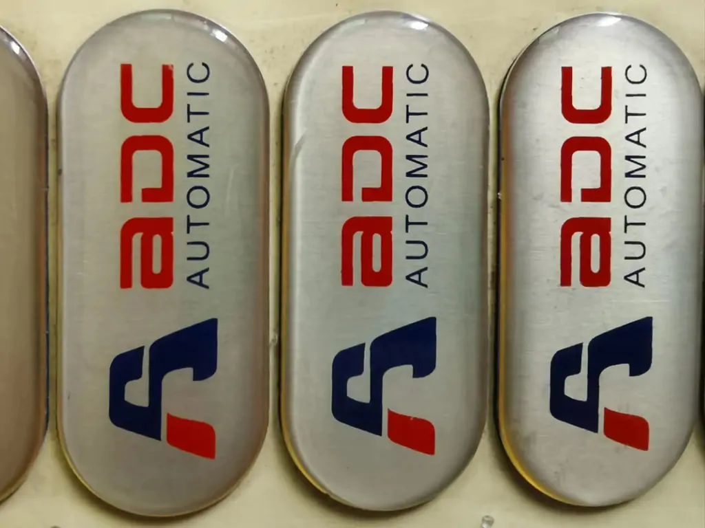 Epoxy AB doming resin for metal nameplates, high clarity, abrasion resistant for industrial labels