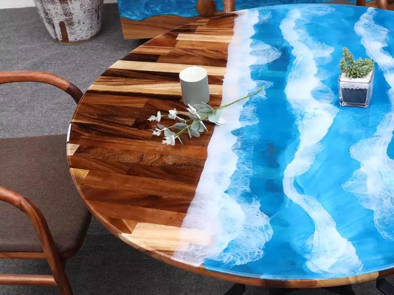 The production process of resin river table