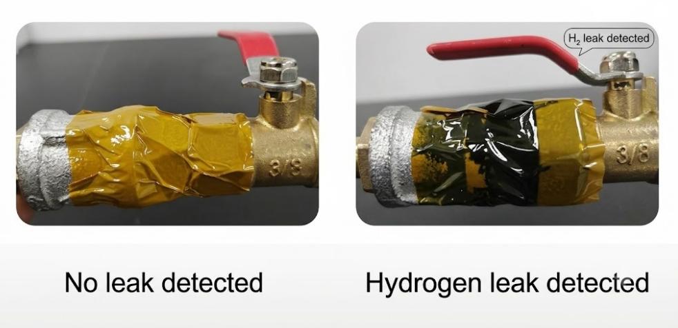 Outdoor hydrogen gas pipeline flange wrapped with chemochromic detection tape showing amber to black transition