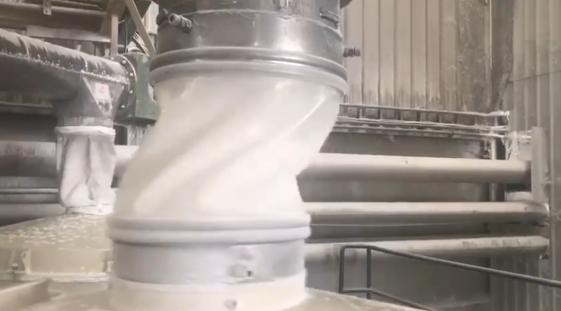 Industrial vibrating screener powder discharge chute connected with flexible polyurethane sleeve