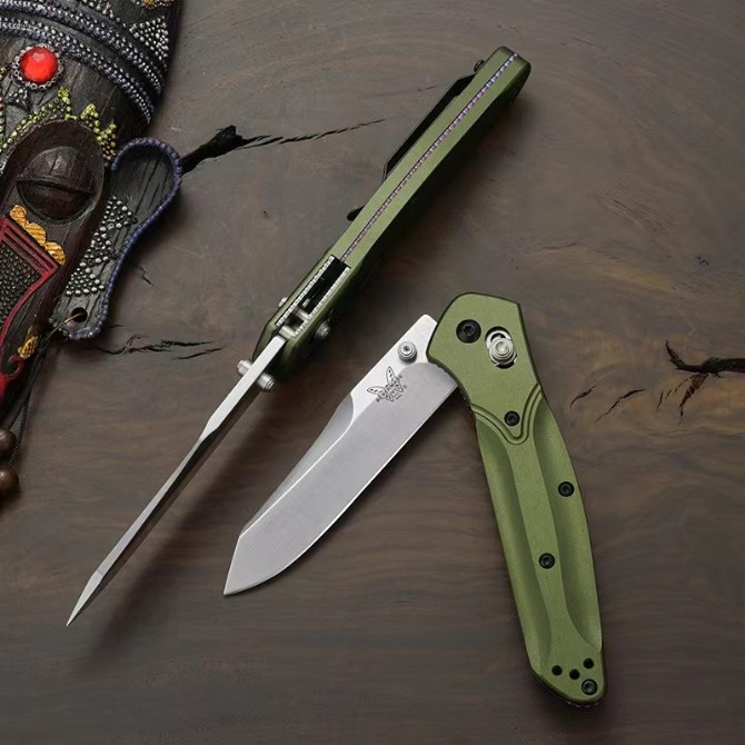 Benchmade-940 folding knife with green aluminum handle